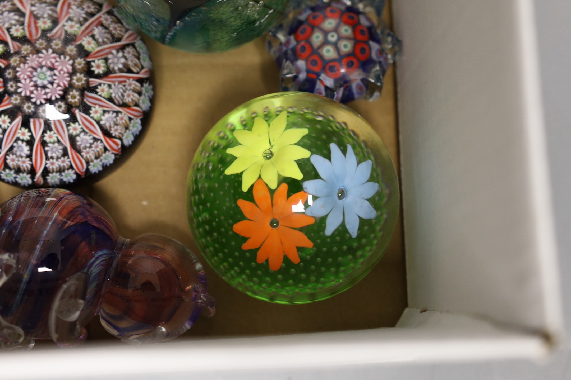 Fourteen various glass paperweights